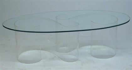 Appraisal: UNKNOWN Lucite table Circa s Ovoid glass table top all