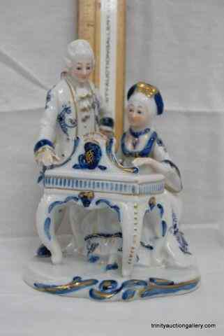 Appraisal: Vintage Blue on White Porcelain Colonial FigurineThis is for a