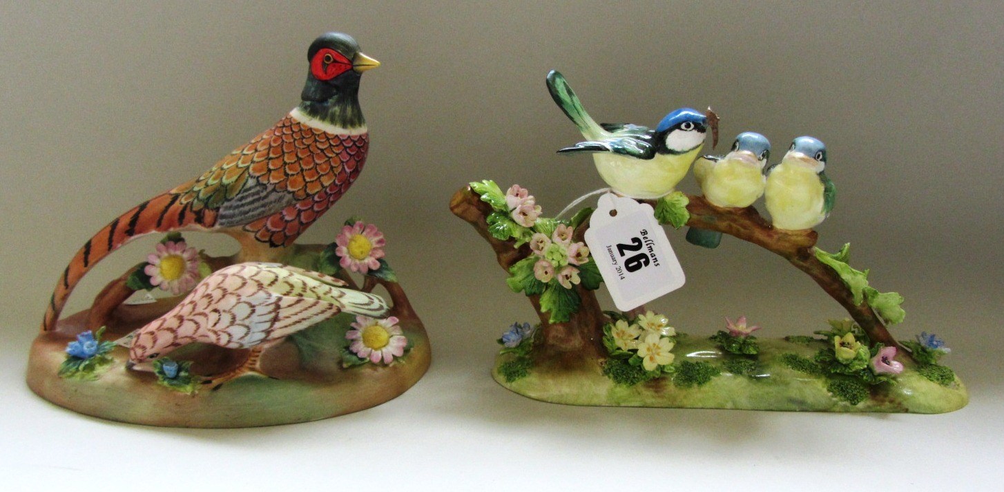 Appraisal: Two Crown Staffordshire bird groups by J T Jones comprising