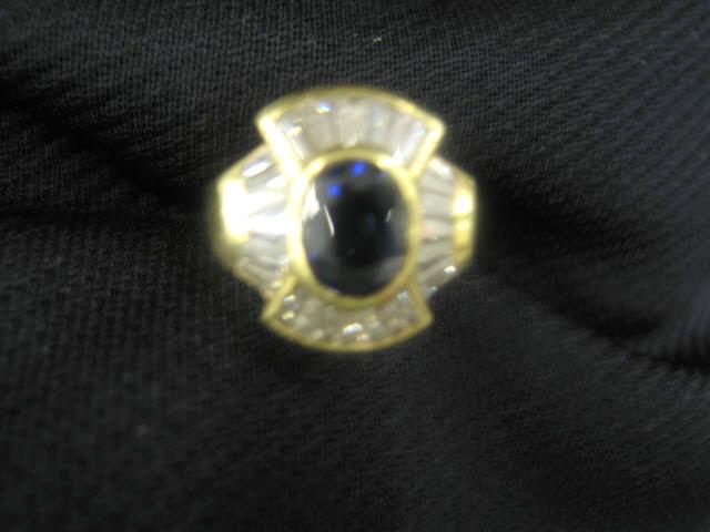 Appraisal: Sapphire Diamond Ring fine oval blue carat gem surrounded by