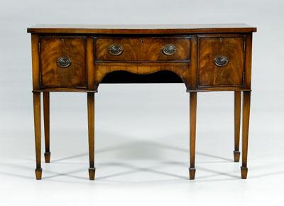 Appraisal: Hepplewhite style mahogany server serpentine front figured mahogany veneers dovetailed