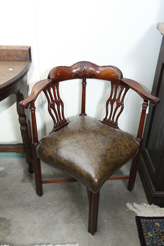 Appraisal: CHIPPENDALE STYLE CORNER CHAIR Mahogany with a carved crest knuckled