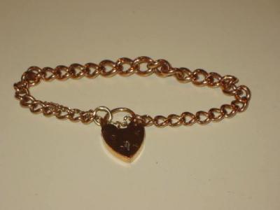 Appraisal: A CT GOLD ROSE GOLD BRACELET of flattened curb link