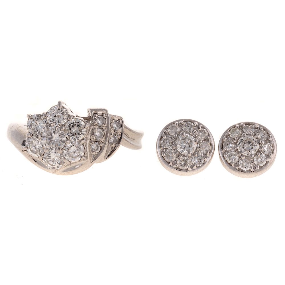 Appraisal: A Pair of Platinum Diamond Earrings Floral Ring platinum floral