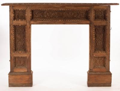 Appraisal: A carved oak fire surround set panels of acanthus leaves