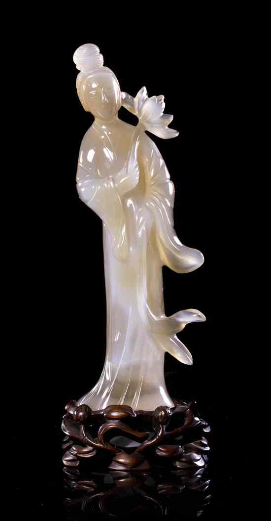 Appraisal: An Agate Carving of a Lady the standing figure shown