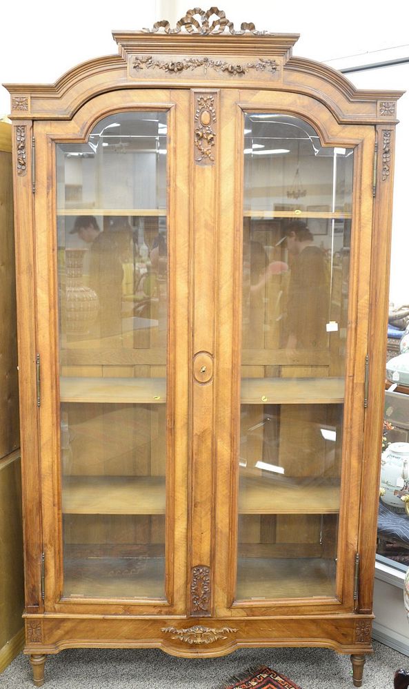 Appraisal: Louis XVI style two door display cabinet with beveled glass