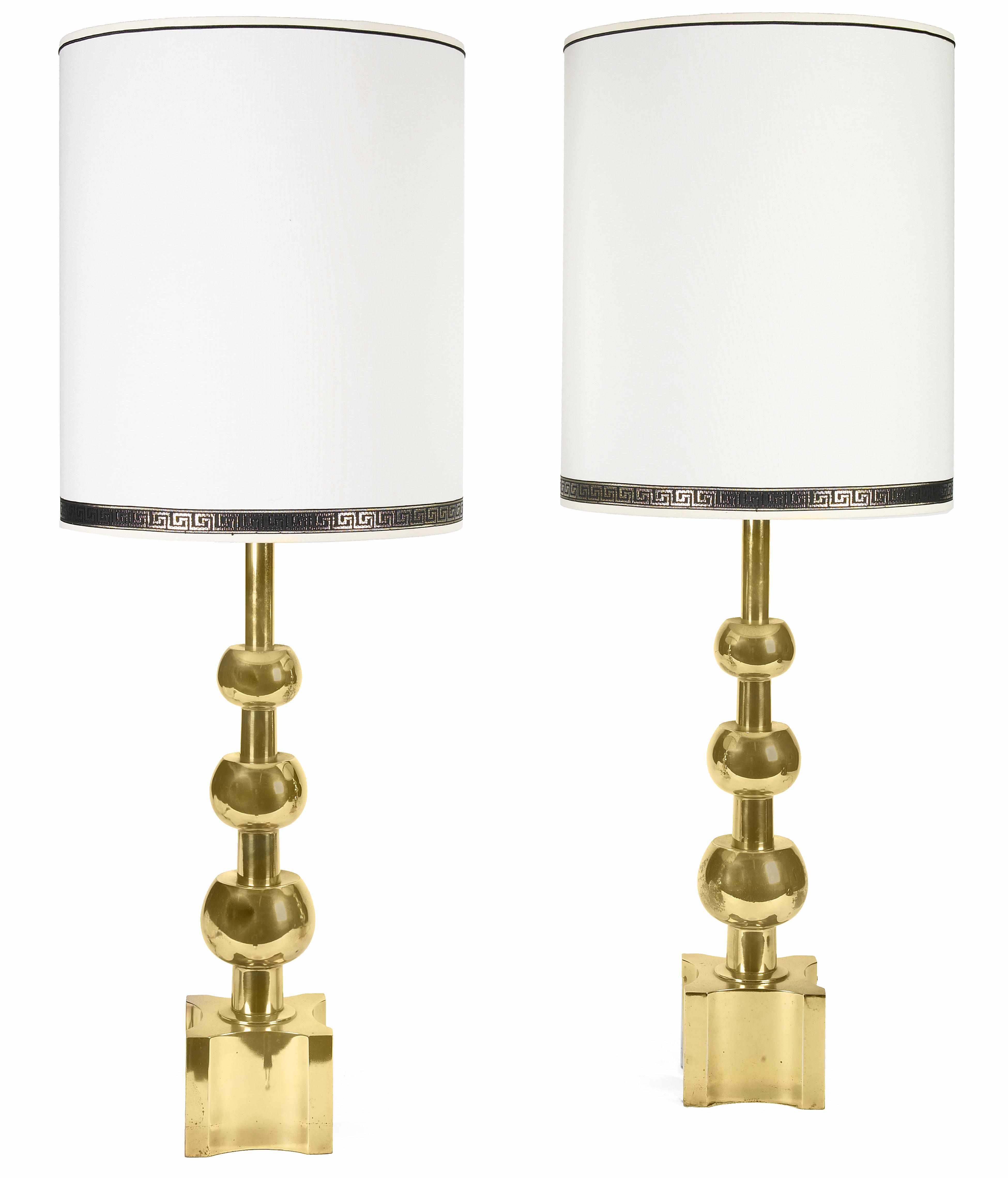 Appraisal: A pair of Stiffel brass lamps attributed to Tommi Parzinger