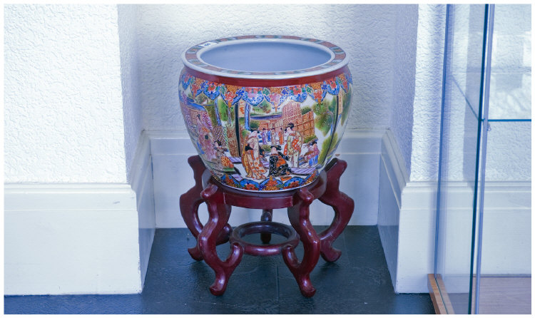 Appraisal: Chinese Goldfish Bowl heavily decorated goldfish interior with carved stand