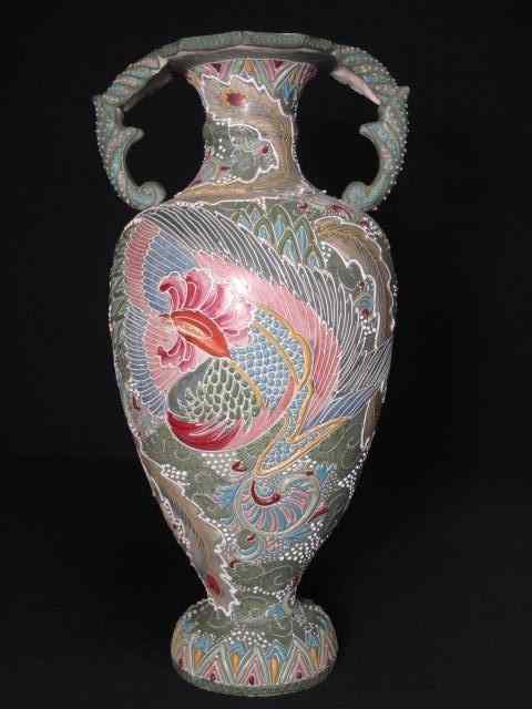 Appraisal: Large Japanese handled earthenware vase with Moriage design on a