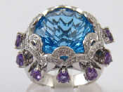 Appraisal: A white metal tests carat gold blue topaz ring with