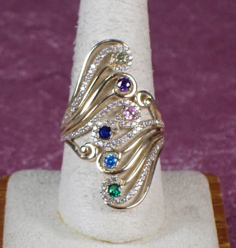 Appraisal: FOURTEEN KARAT GOLD RING WITH MULTI COLOR CZ The k