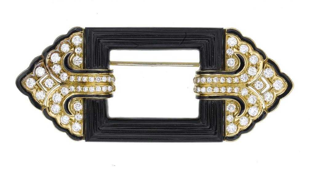 Appraisal: A DIAMOND ONYX AND GOLD AND ENAMEL BROOCH of geometric