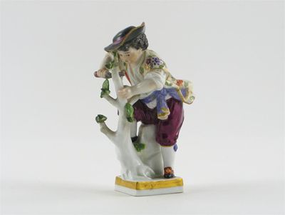 Appraisal: A Meissen figure of a young gardener pruning a tree