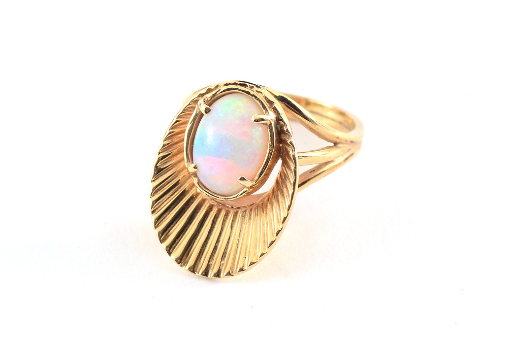 Appraisal: RETRO OPAL RING K yellow gold fan ring with a