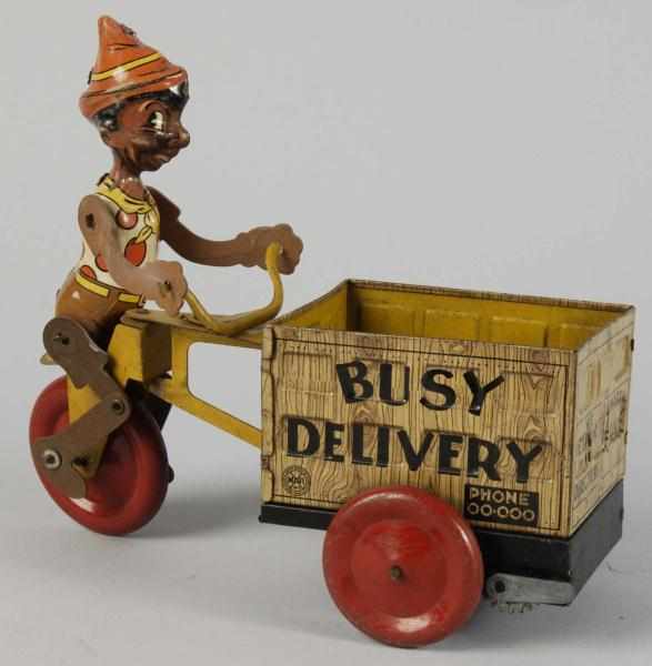 Appraisal: Tin Litho Marx Pinocchio Busy Delivery Toy Description American Wind-up