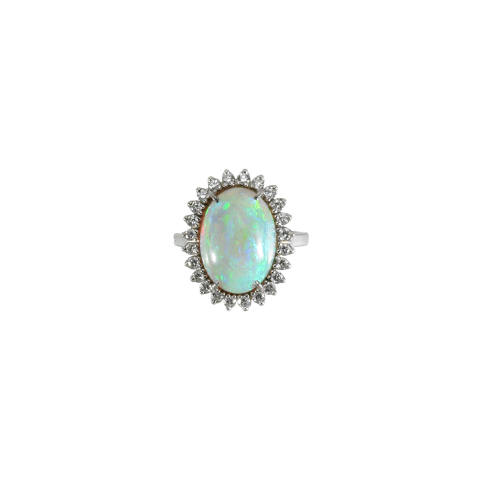 Appraisal: k White Gold Ring set with an oval opal cabochon