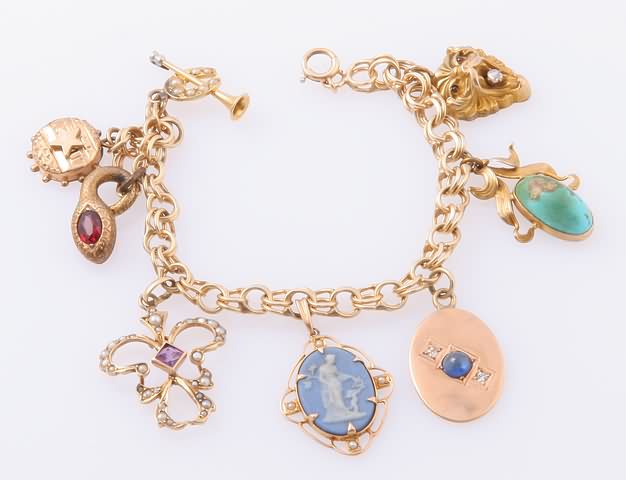 Appraisal: KY link bracelet with various K K gold filled gold-plated