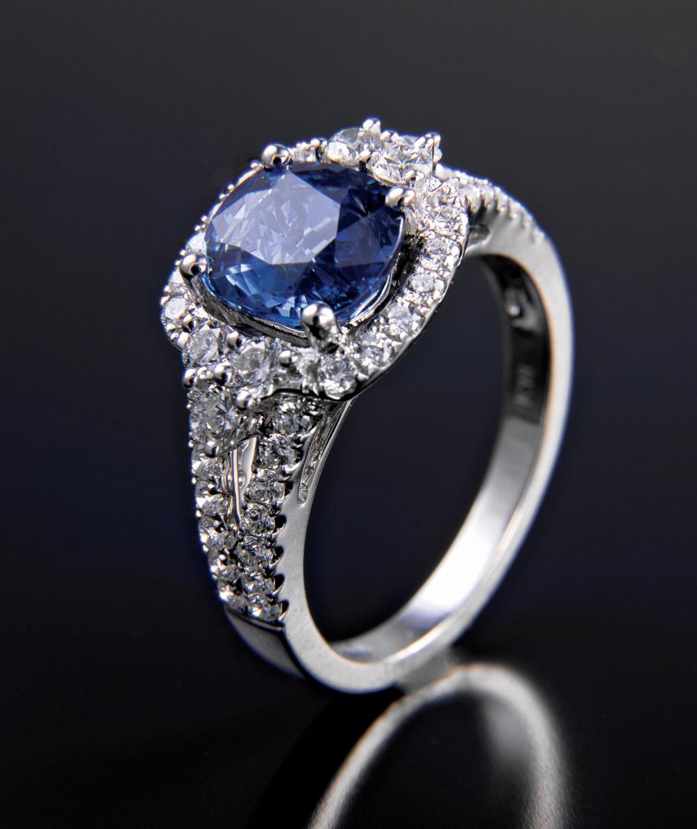 Appraisal: kt White Gold Blue Sapphire and Diamond Ring prong-set cushion