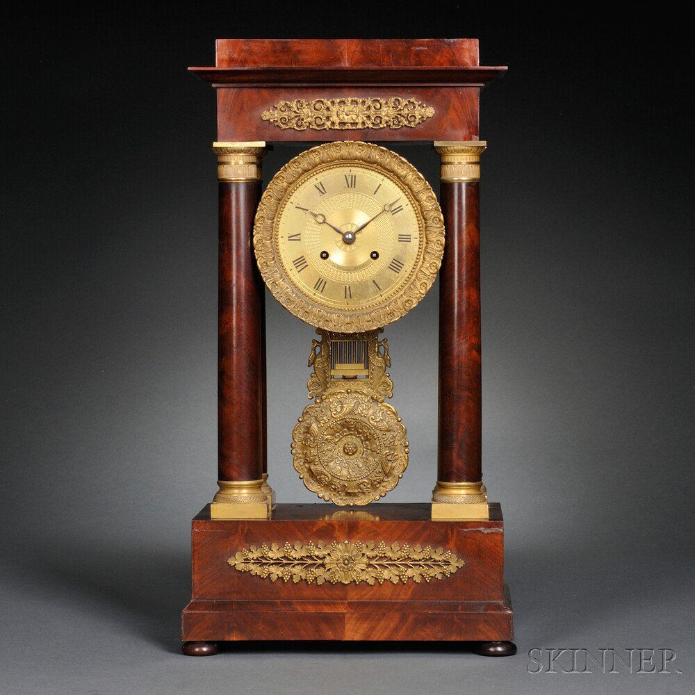 Appraisal: Mahogany and Gilt-brass French Portico Clock c the mahogany veneered