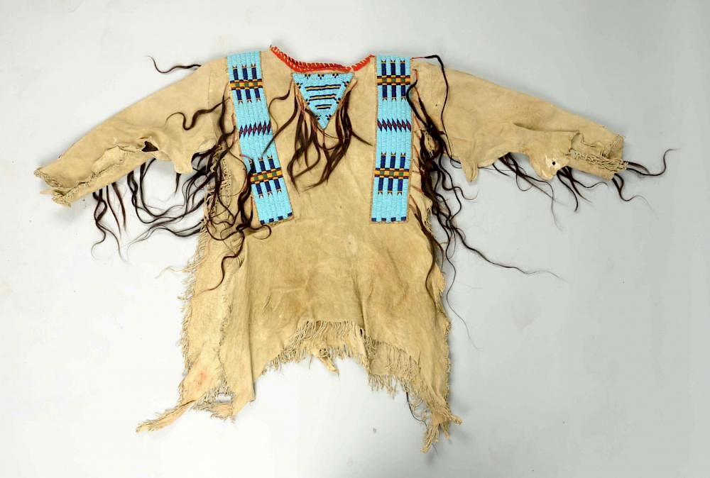 Appraisal: Cheyenne Beaded War Shirt Beaded on buffalo with hair drops