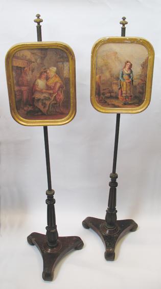 Appraisal: A PAIR OF REGENCY ROSEWOOD POLE SCREENS with gilt metal