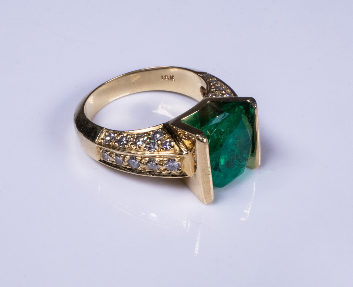 Appraisal: LADIES K GOLD EMERALD AND DIAMOND RING Custom made contemporary