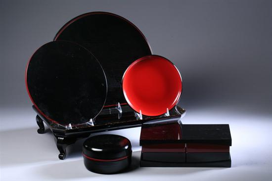 Appraisal: EIGHT JAPANESE BLACK AND RED LACQUER TRAYS th century Of