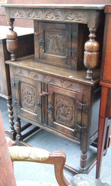 Appraisal: A th century oak court cupboard of small proportions the