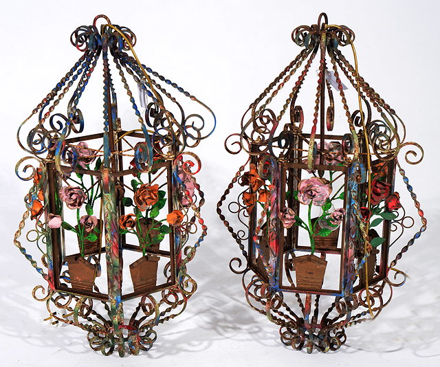 Appraisal: A PAIR OF DECORATIVE POLYCHROME PAINTED HEXAGONAL WROUGHT IRON HANGING