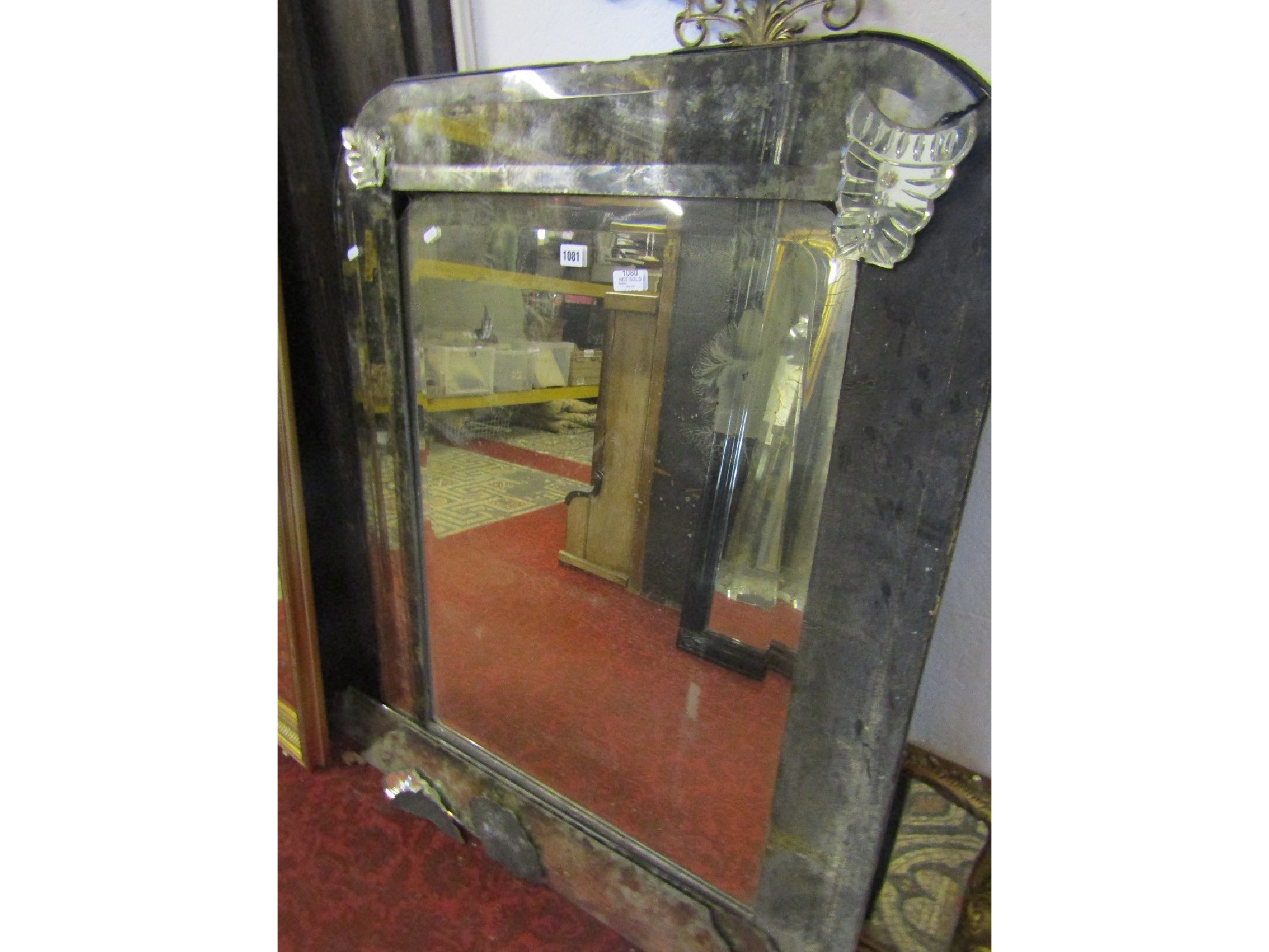 Appraisal: A late th early th century wall mirror in the