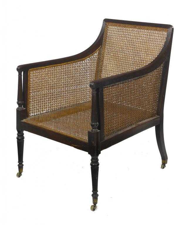 Appraisal: A VICTORIAN MAHOGANY AND CANED BERG RE with reeded frame