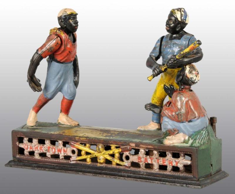 Appraisal: Cast Iron Darktown Battery Mechanical Bank Description Manufactured by J