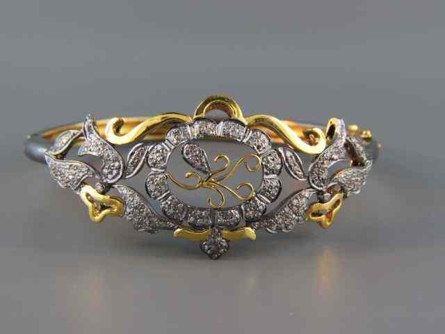 Appraisal: Diamond Bangle Bracelet well over diamonds totaling carats in gold