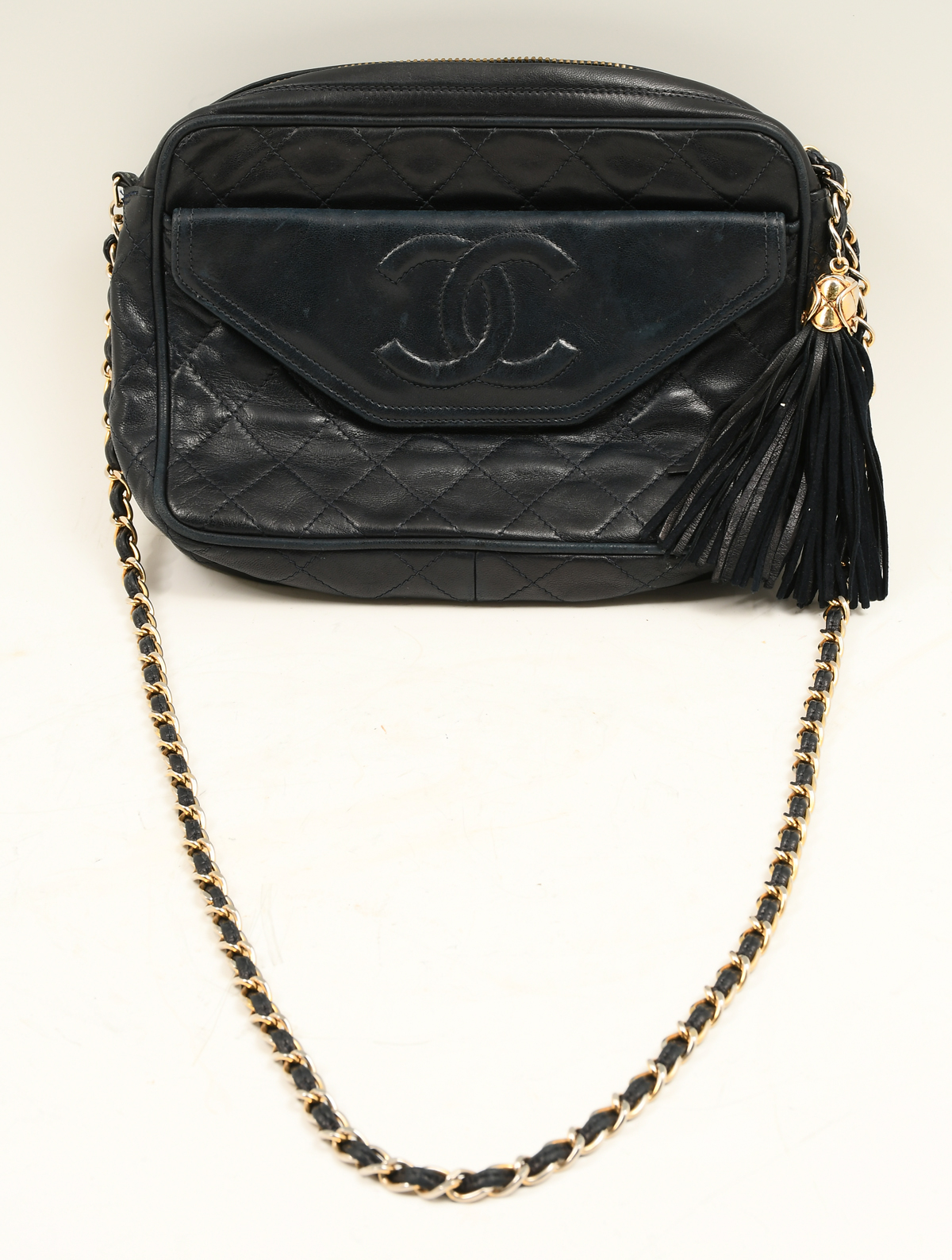 Appraisal: VINTAGE CHANEL NAVY CC TASSEL CAMERA BAG Wonderful navy cross