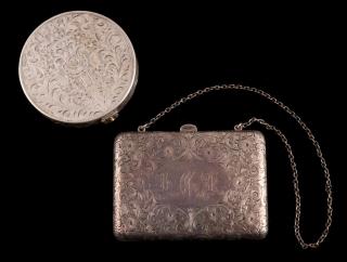 Appraisal: An silver compact hand chased designs hinged clasp marked inside