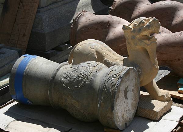 Appraisal: An archaistic carved stone chimera Modeled in a Han style