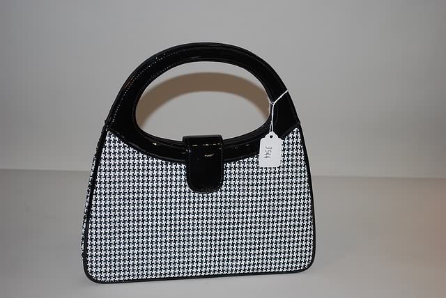 Appraisal: Lulu Guinness black patentleather handbag with black white hounds tooth