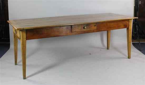 Appraisal: A th century French cherrywood kitchen table with two drawers