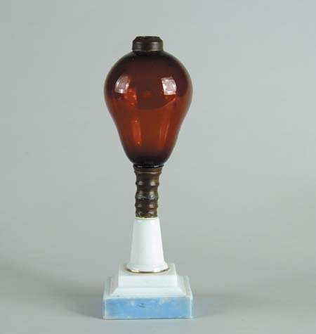 Appraisal: AMBER AND MILK GLASS OIL LAMP Stepped base with light