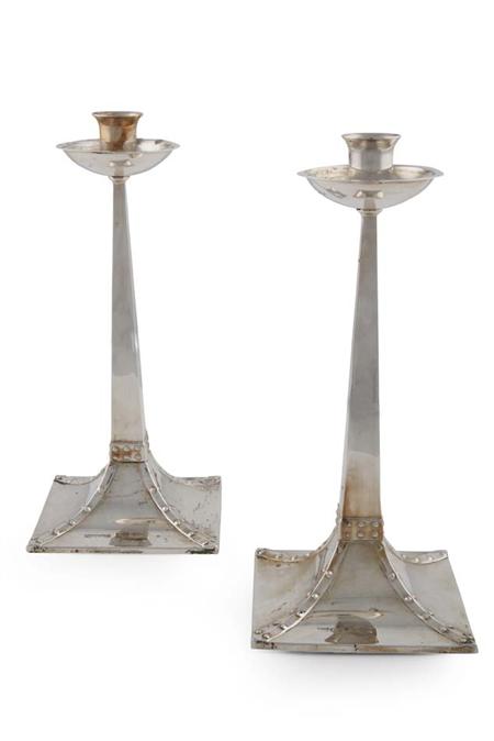 Appraisal: A pair of Arts and Crafts style candlesticks Mappin Webb