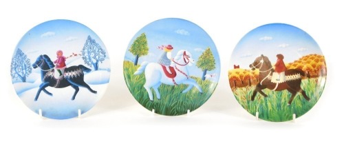 Appraisal: Three Poole pottery plates each depicting figures on horseback cm