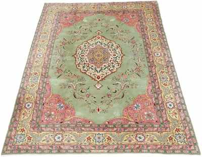 Appraisal: A Signed Tabriz Estate Carpet Medium low wool pile on