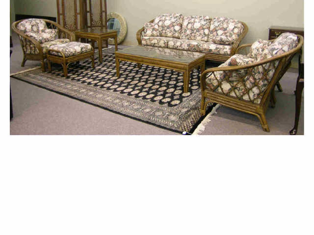 Appraisal: Rattan sunroom furniture suite by Benchmark including sofa loveseat chair