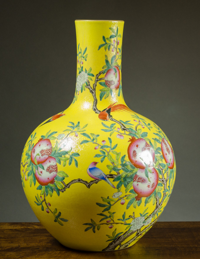 Appraisal: CHINESE QING FAMILLE ROSE PORCELAIN VASE bottle form with pomegranate