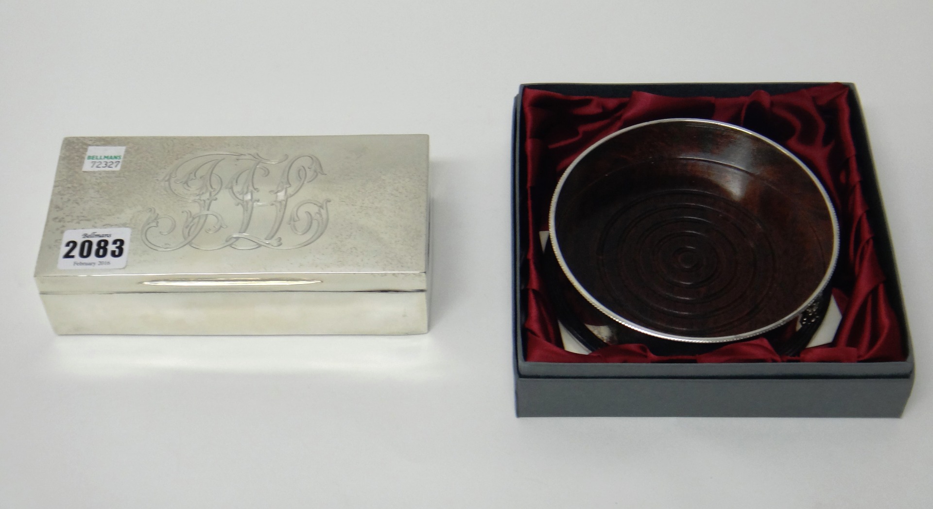 Appraisal: A silver cigarette box of plain rectangular form the cover