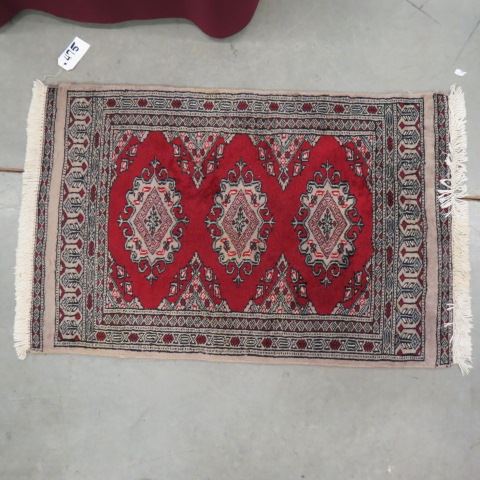 Appraisal: Belouchi Persian Handmade Mat geometrics red indigio and ivory '