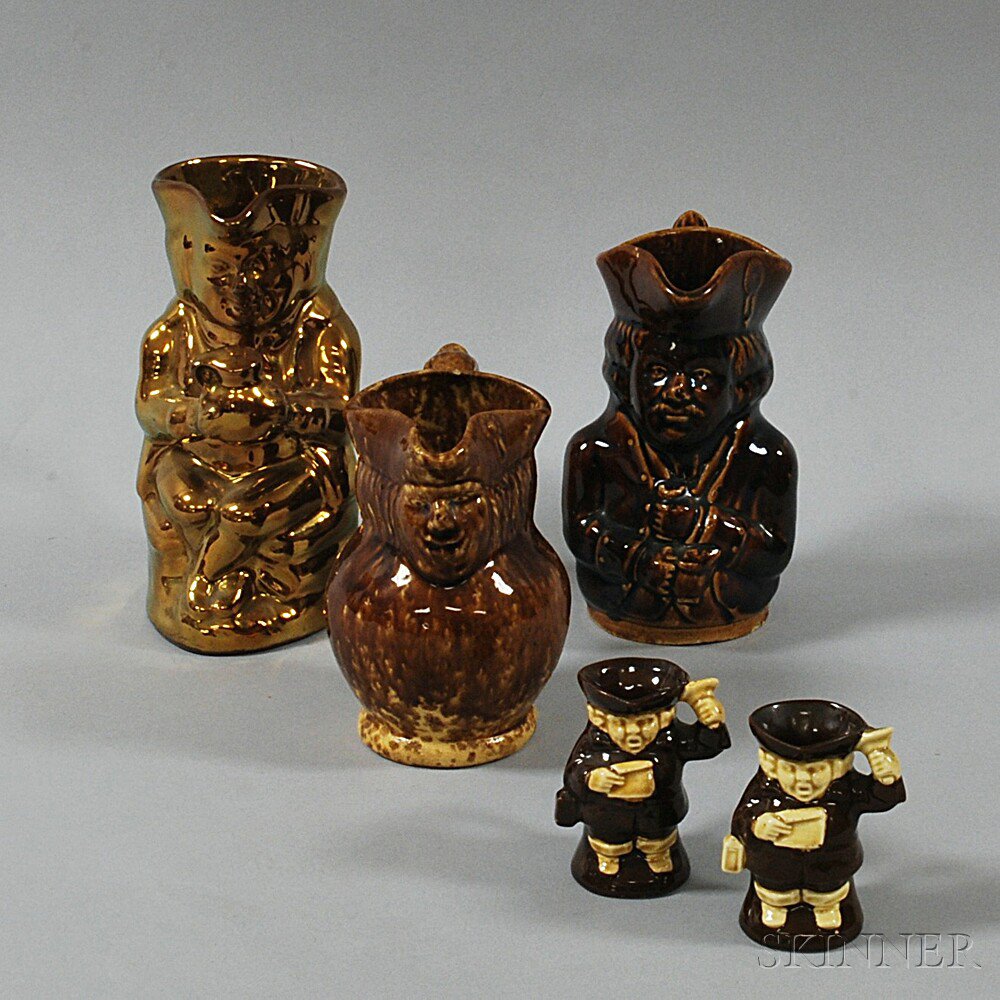 Appraisal: Five Brown-glazed Toby Jugs including one luster one marked Gibson