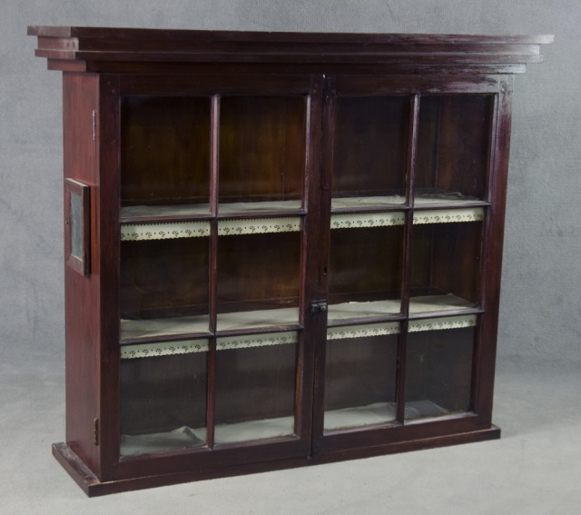 Appraisal: Walnut Glass-Front CabinetLate th century Having two six-light glazed doors