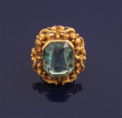 Appraisal: An early Victorian aquamarine ring The octagonal cut aquamarine is